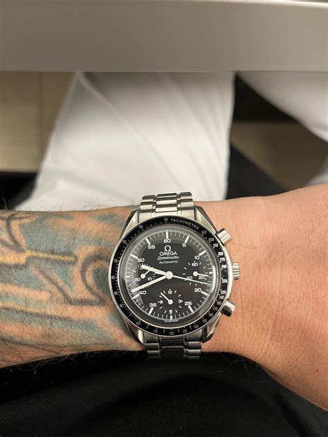omega speedmaster on small wrist